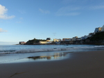 FZ020895 Reflection in beach of colourful houses in Tenby.jpg